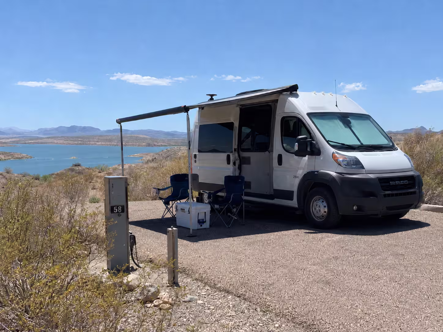 Class B camper van at a hookup campsite in Elephant Butte Lake State Park