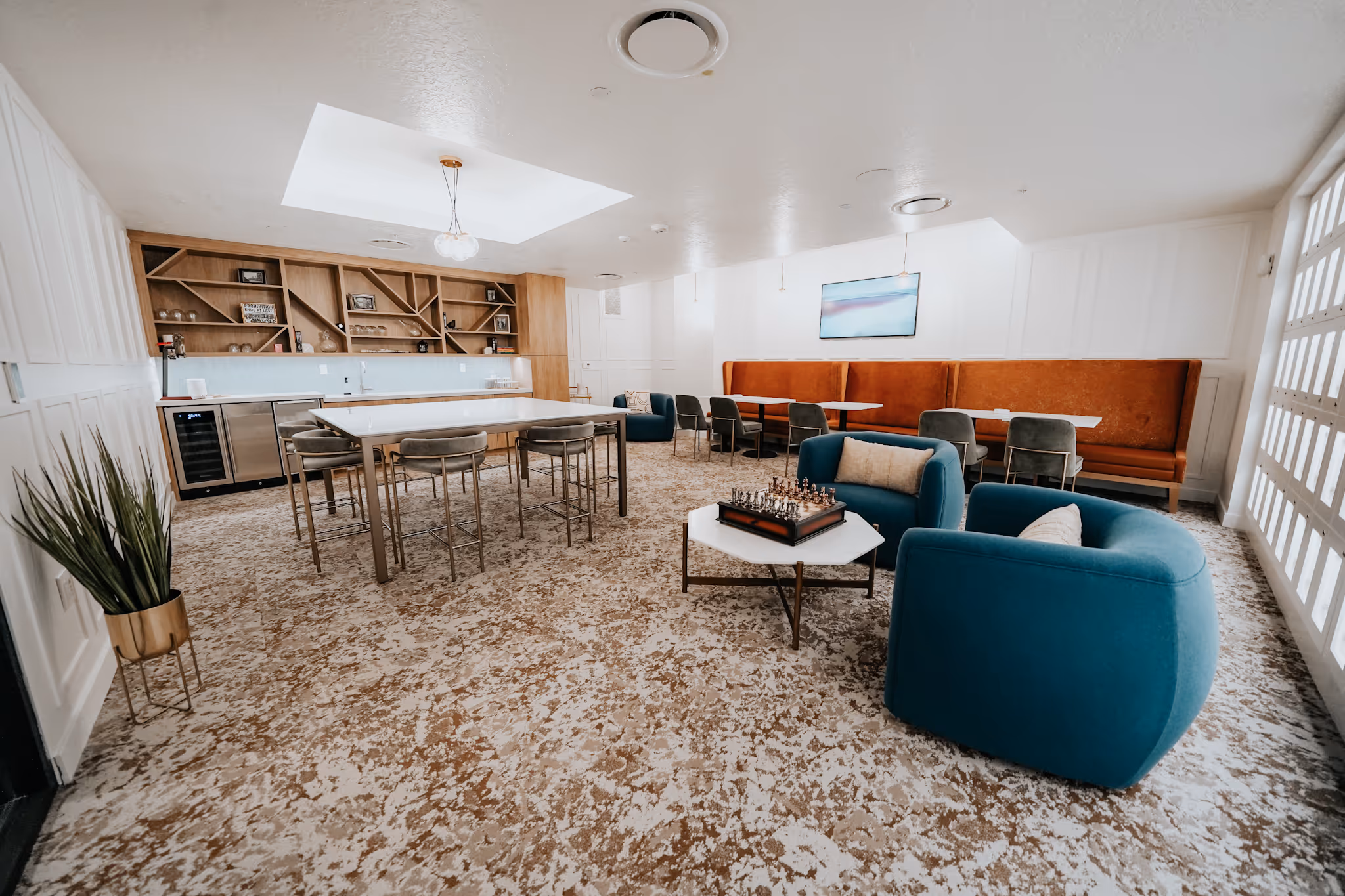 clubhouse kitchen with chairs and tables