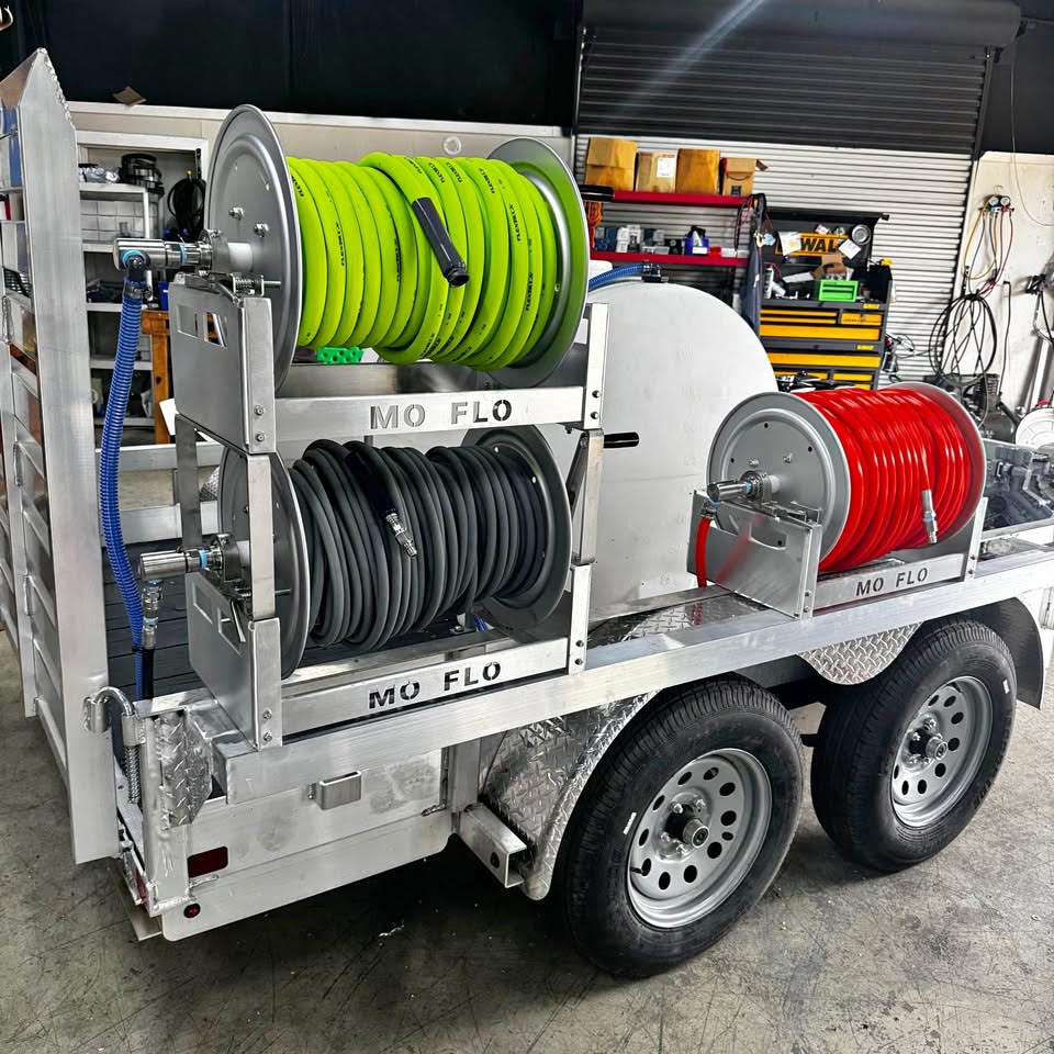 Dialed In Pro Cleaning commercial pressure washing rig with multiple hose reels