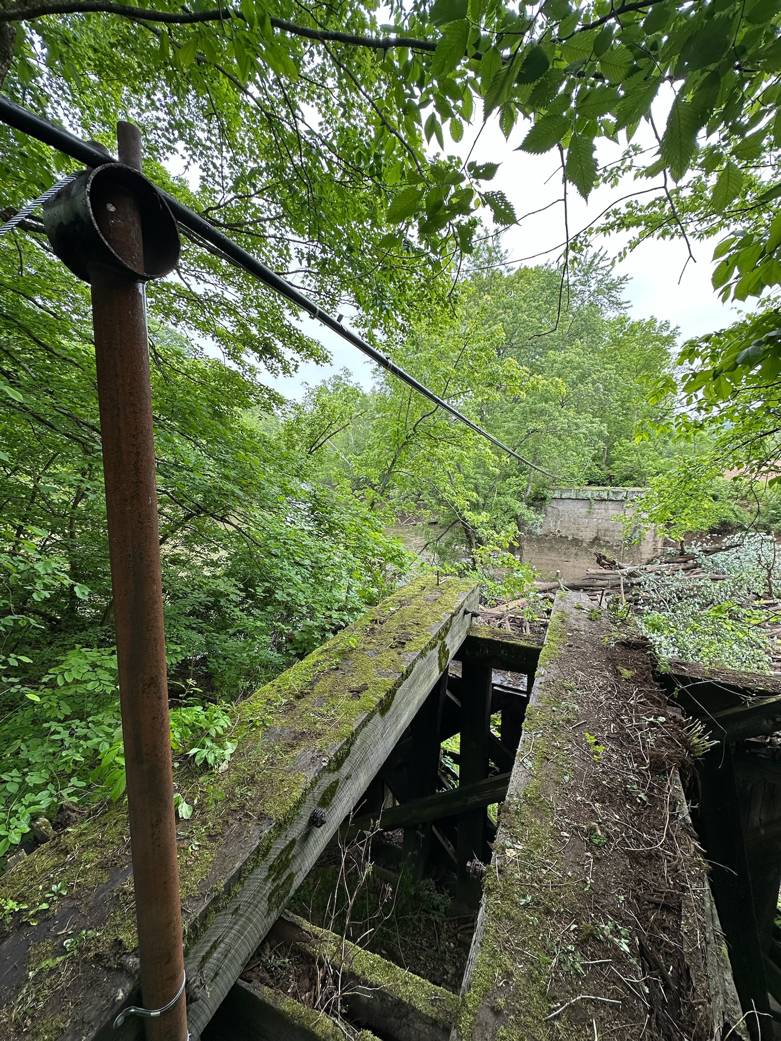 image of team in front of company building (for a roofing contractor)