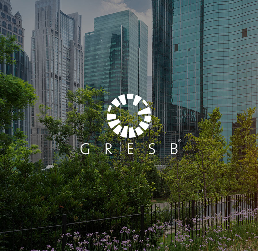 GRESB logo overlaid on a lush green urban park with glass office towers in the background, Alvéole certification page header
