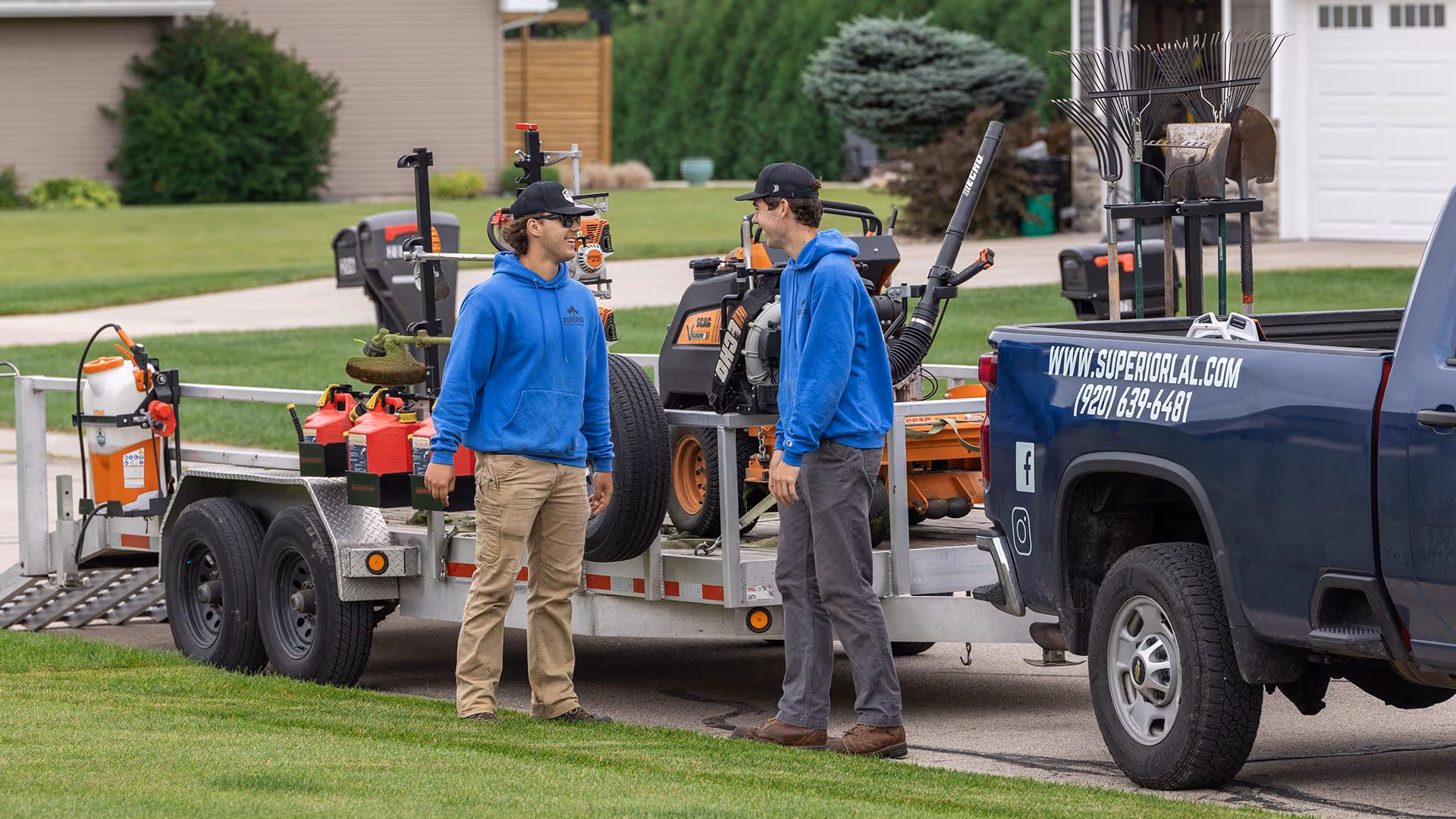 Crew providing routine lawn care service for local properties