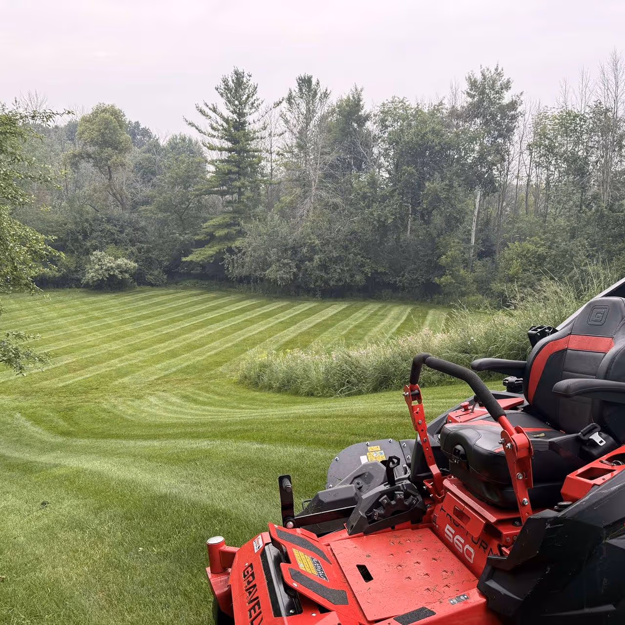 Weekly lawn maintenance service for residential properties