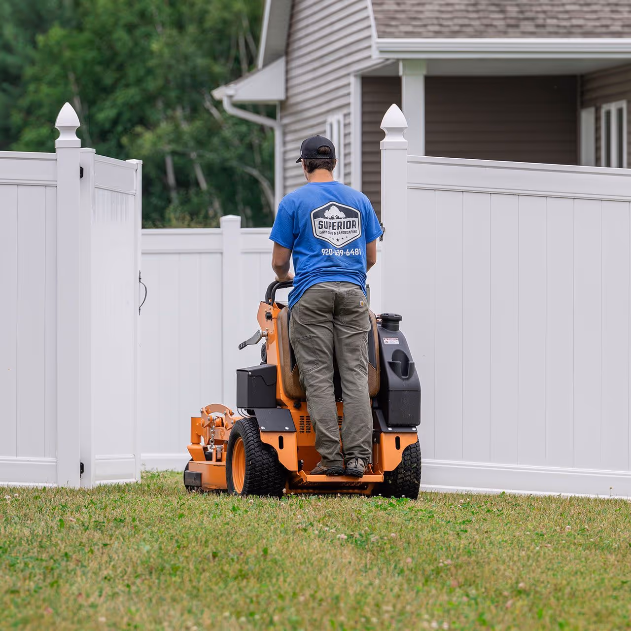 Superior Lawn Care and Landscaping crew working on lawn maintenance