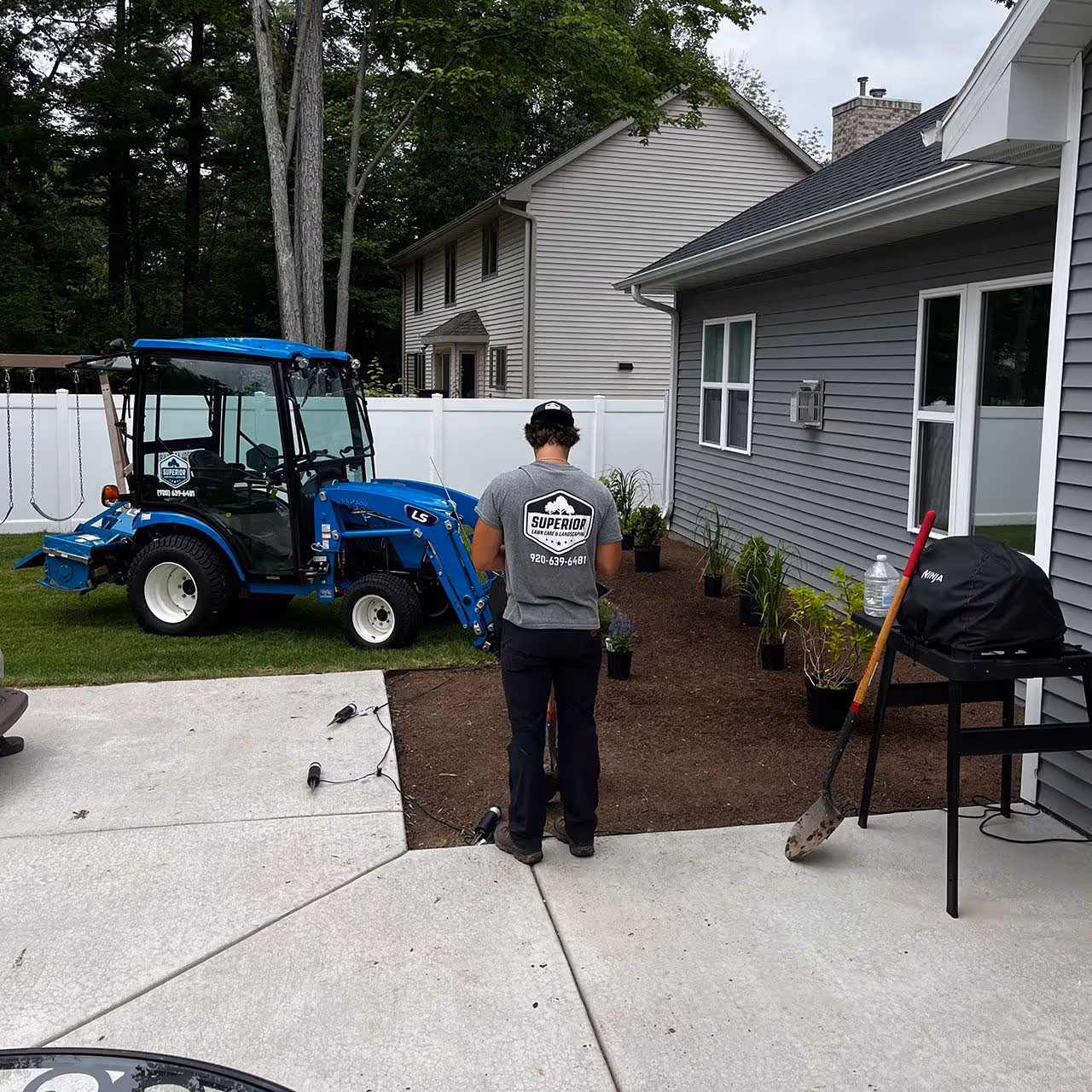 Landscaping tools and equipment setup for property maintenance