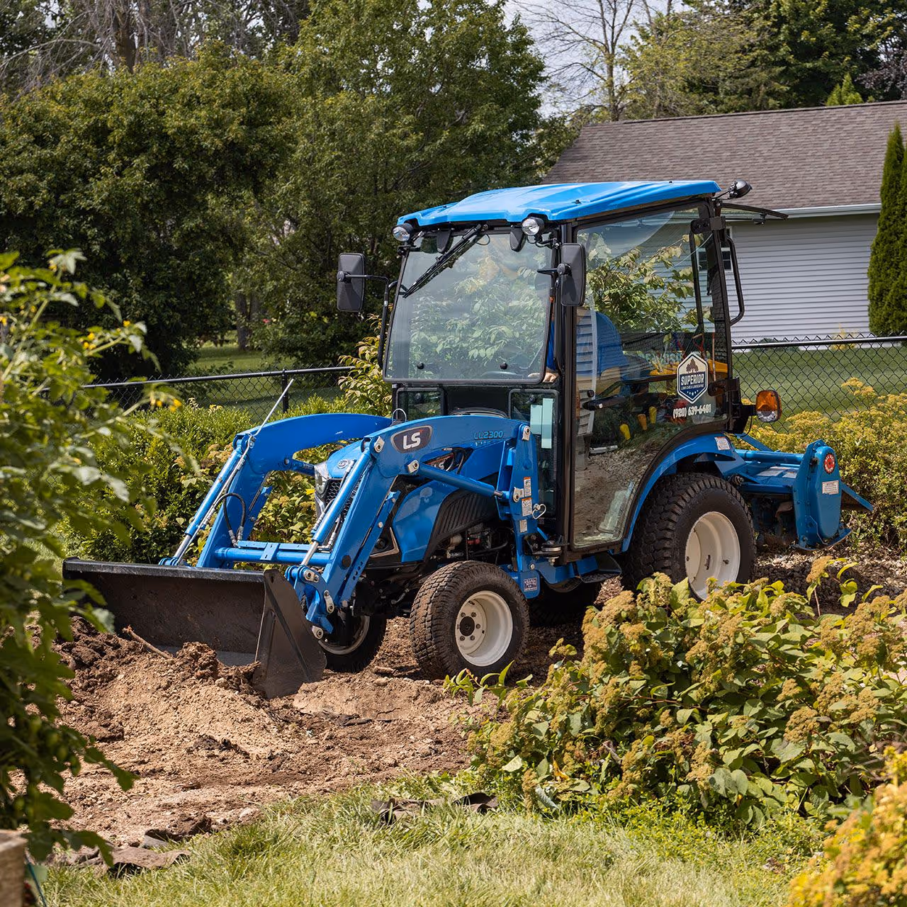 Team working on landscape installation for homes and businesses