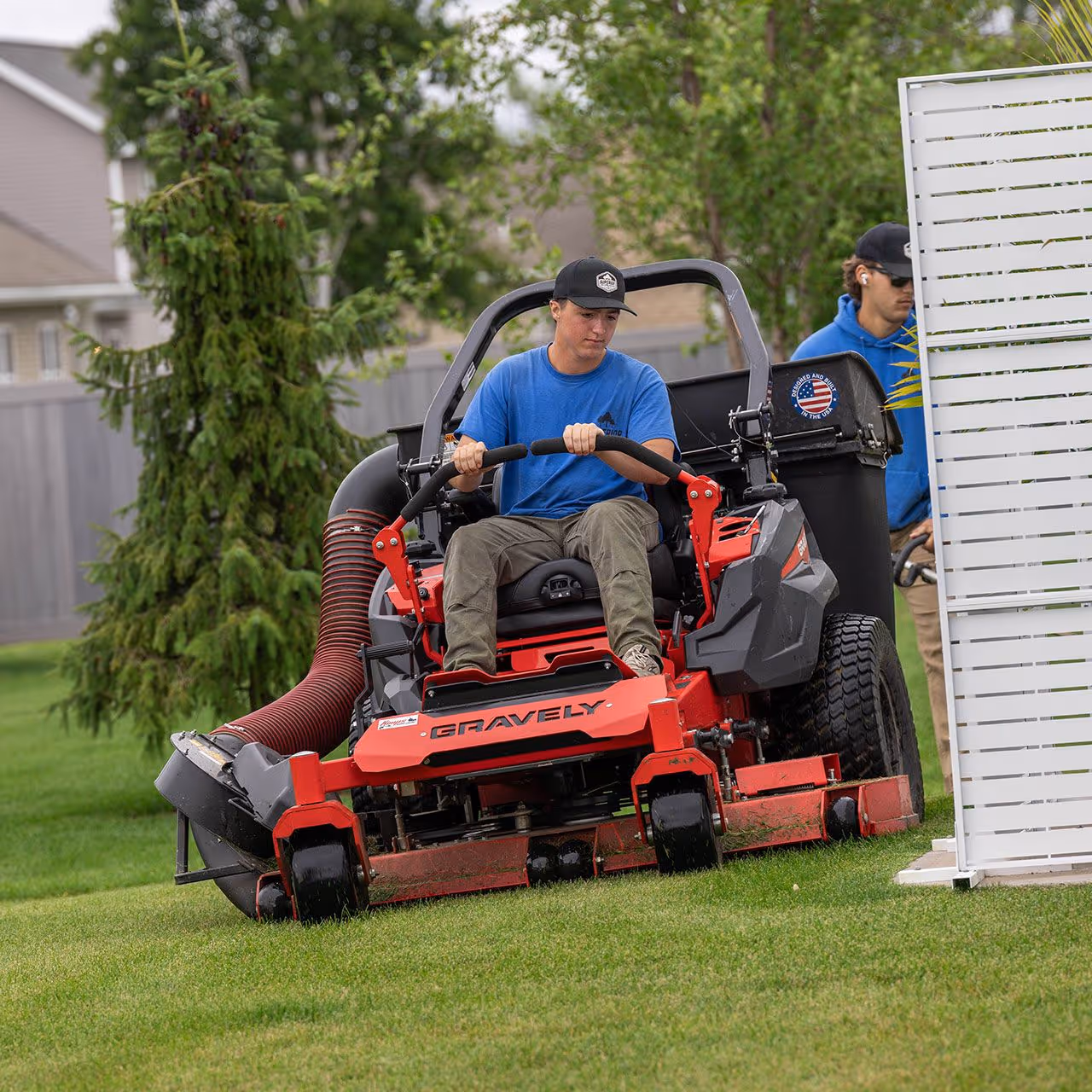Crew performing landscaping and outdoor maintenance services