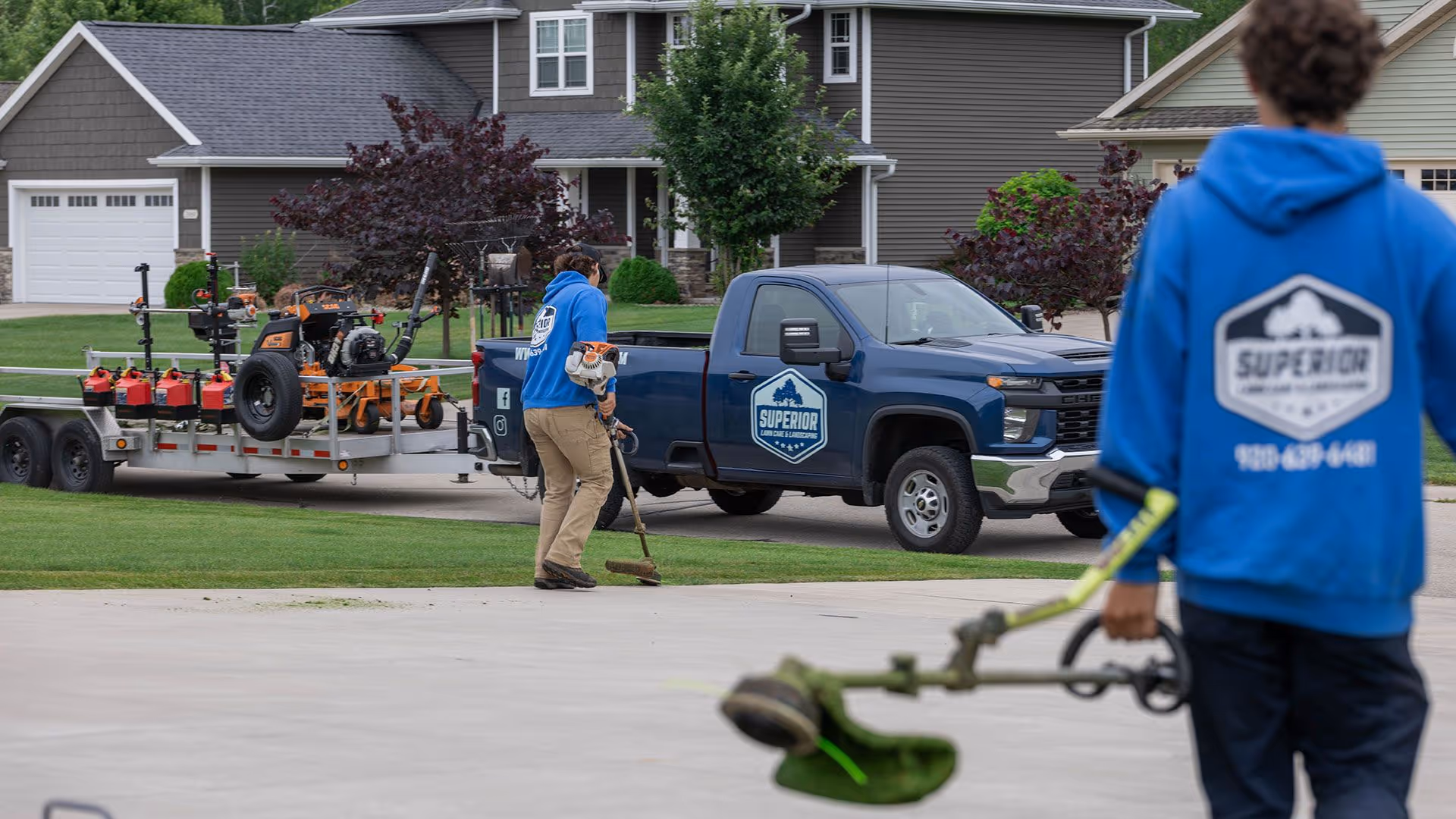 Residential lawn mowing service by Superior Lawn Care and Landscaping