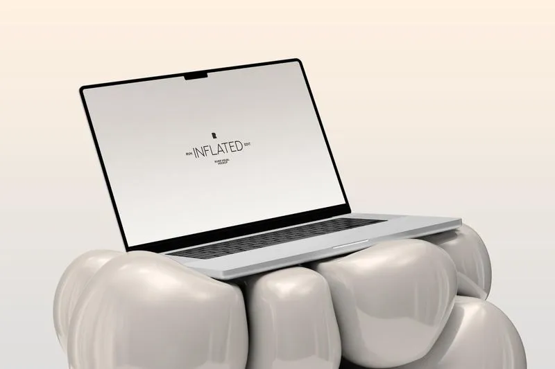 A laptop sitting on top of a group of teeth.