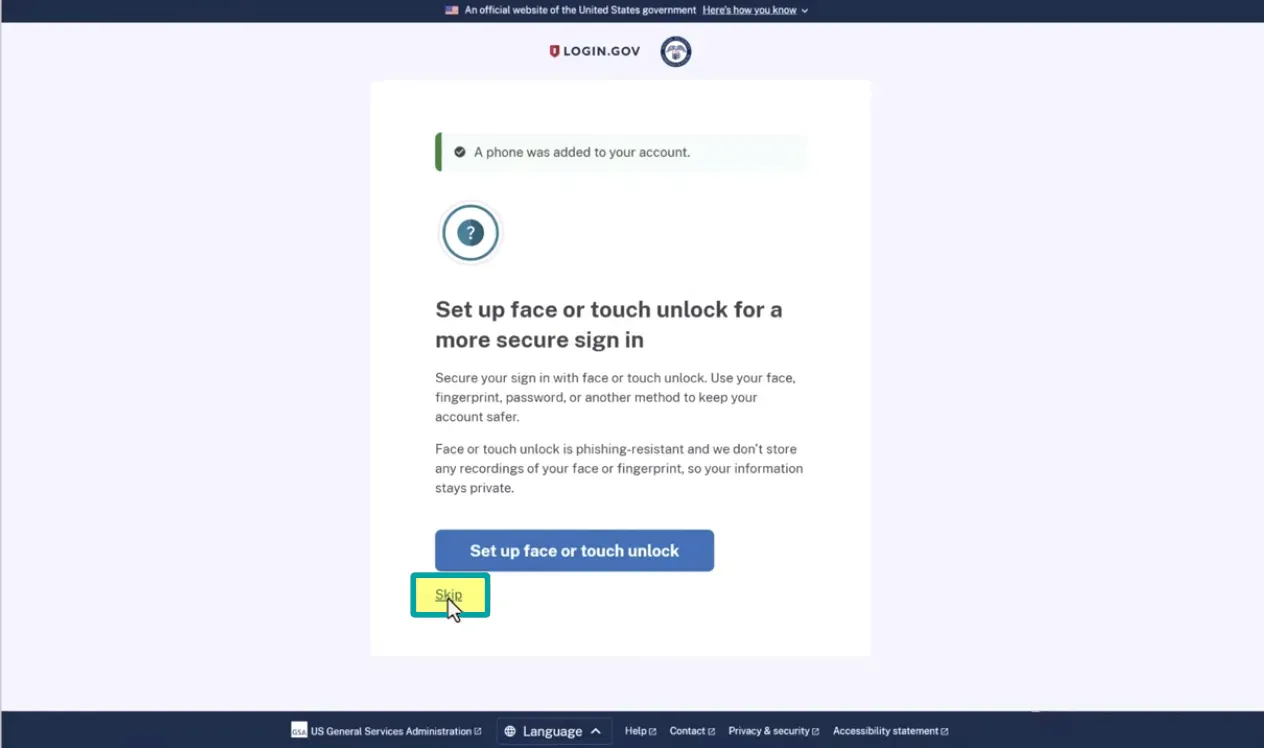 Login.gov screen showing a message that a phone was added to the account, with an option to set up face or touch unlock for more secure sign in, including an explanation that this method is phishing-resistant and does not store face or fingerprint recordings, and buttons to set up face or touch unlock or to skip.