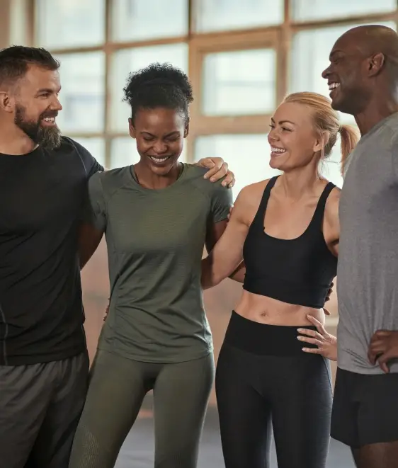 Four people standing together