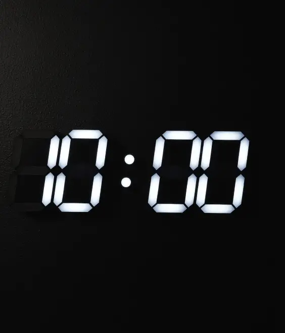 A digital clock with the hours 10:00