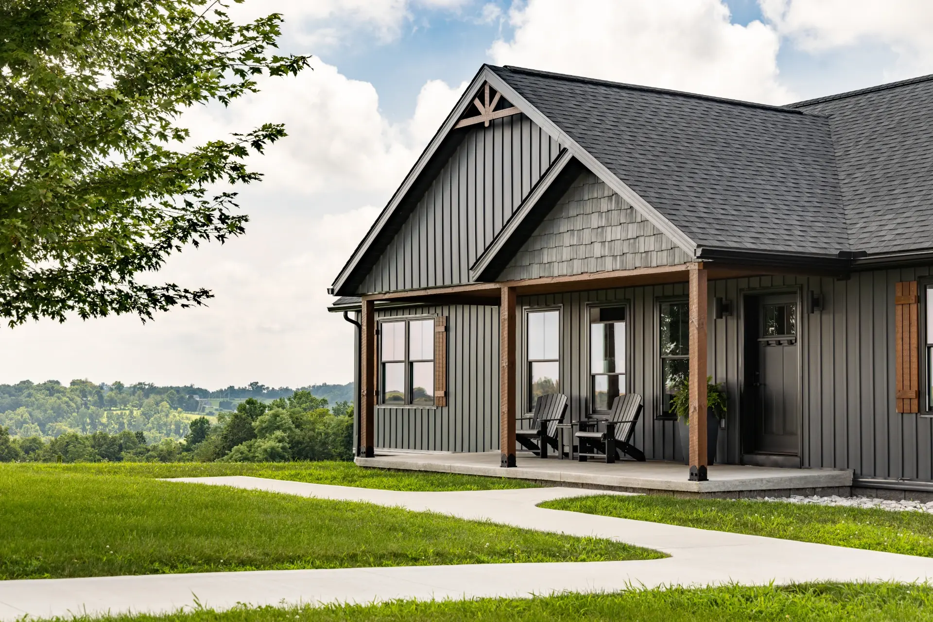 modular home looking over trees full