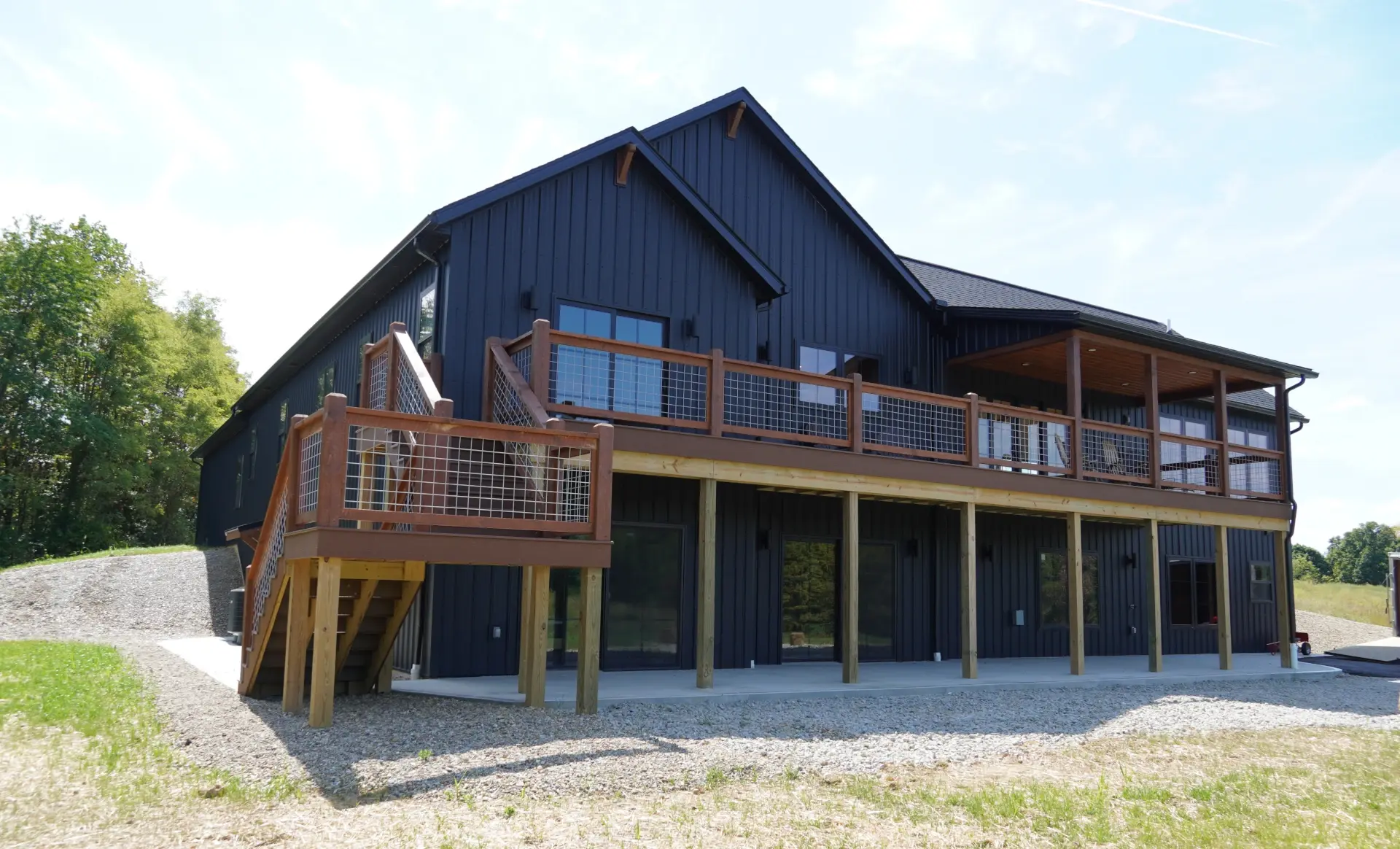modular home with large deck and porch