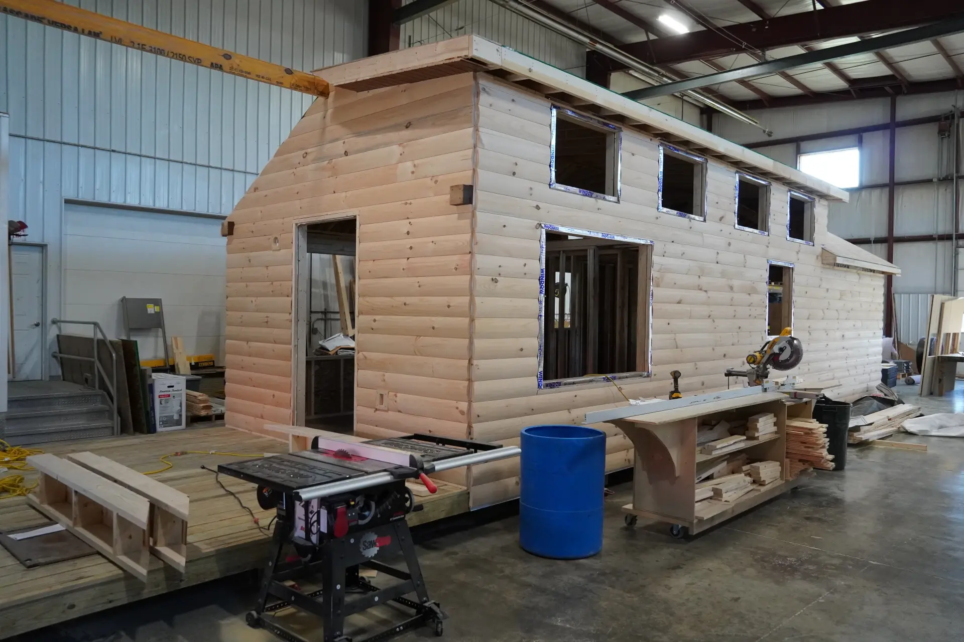 custom log cabin tiny home during construction