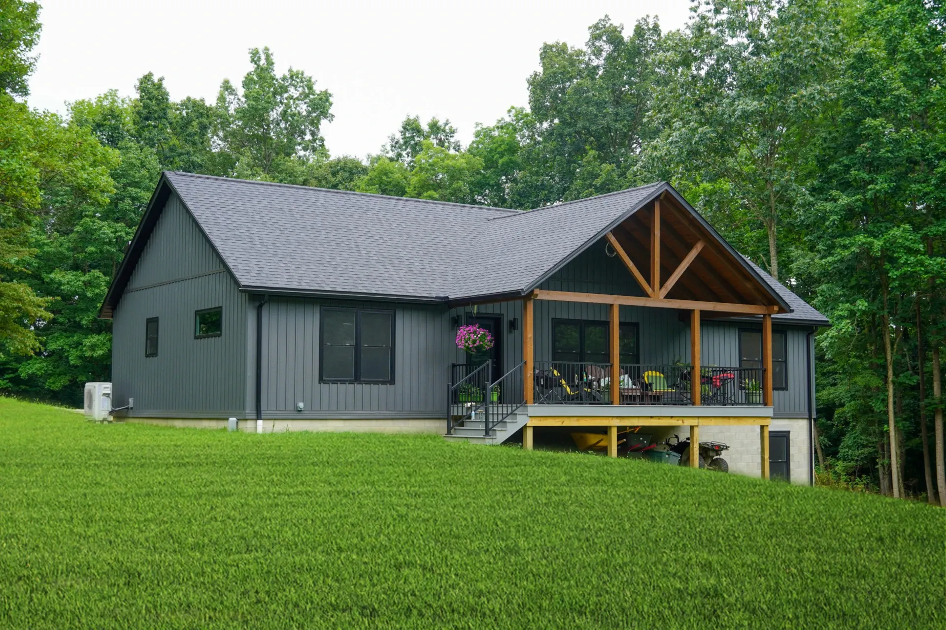 modular home with timber framed porch