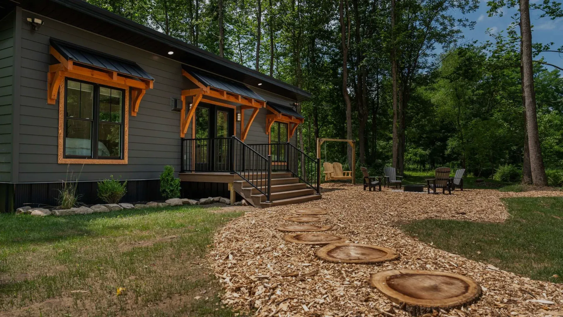 tiny home with wood log walkway