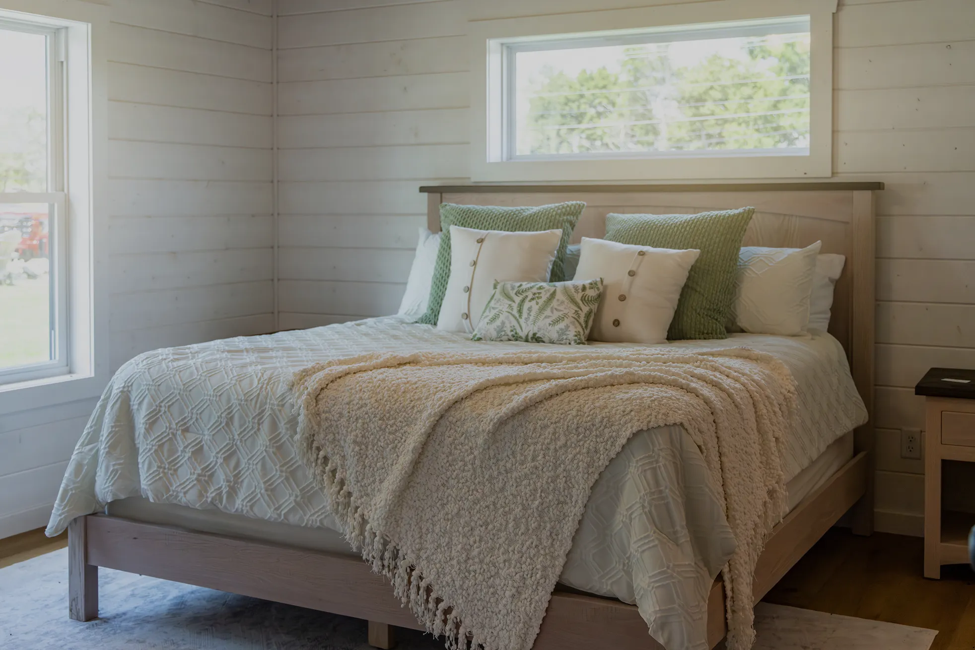 modular home comfy bed with window above bed