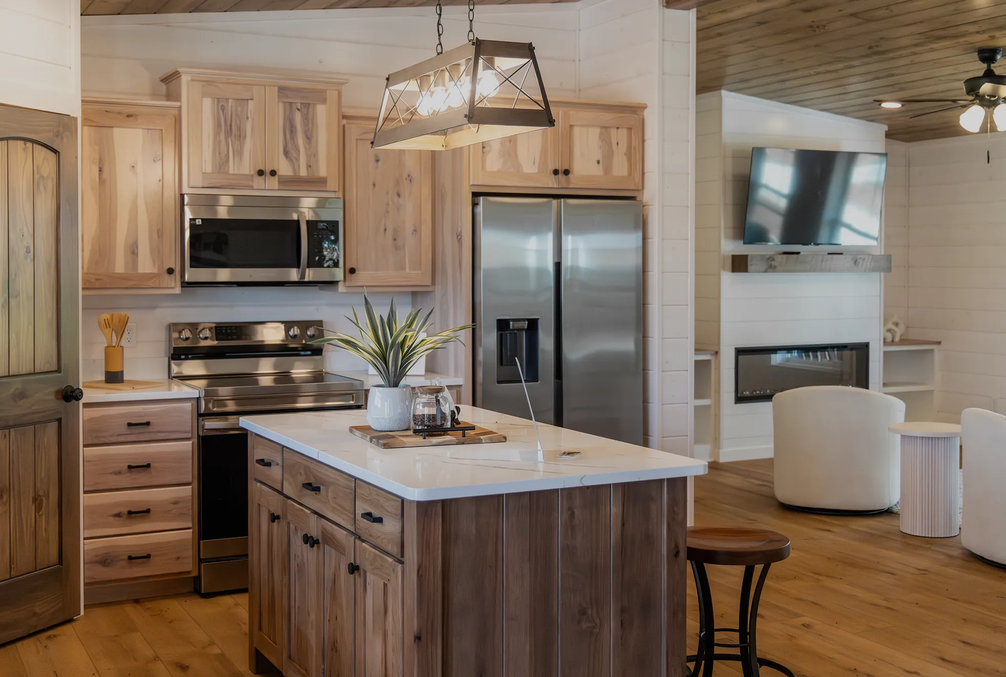modular home open kitchen with custom cabinets