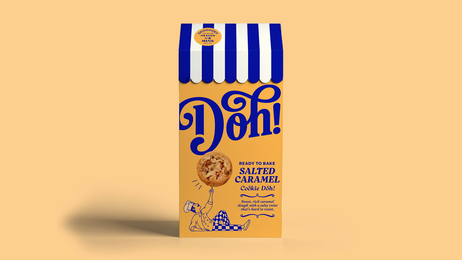 Package of Doh! ready-to-bake salted caramel cookie dough with blue and white striped top and a cartoon chef balancing a cookie on his finger.