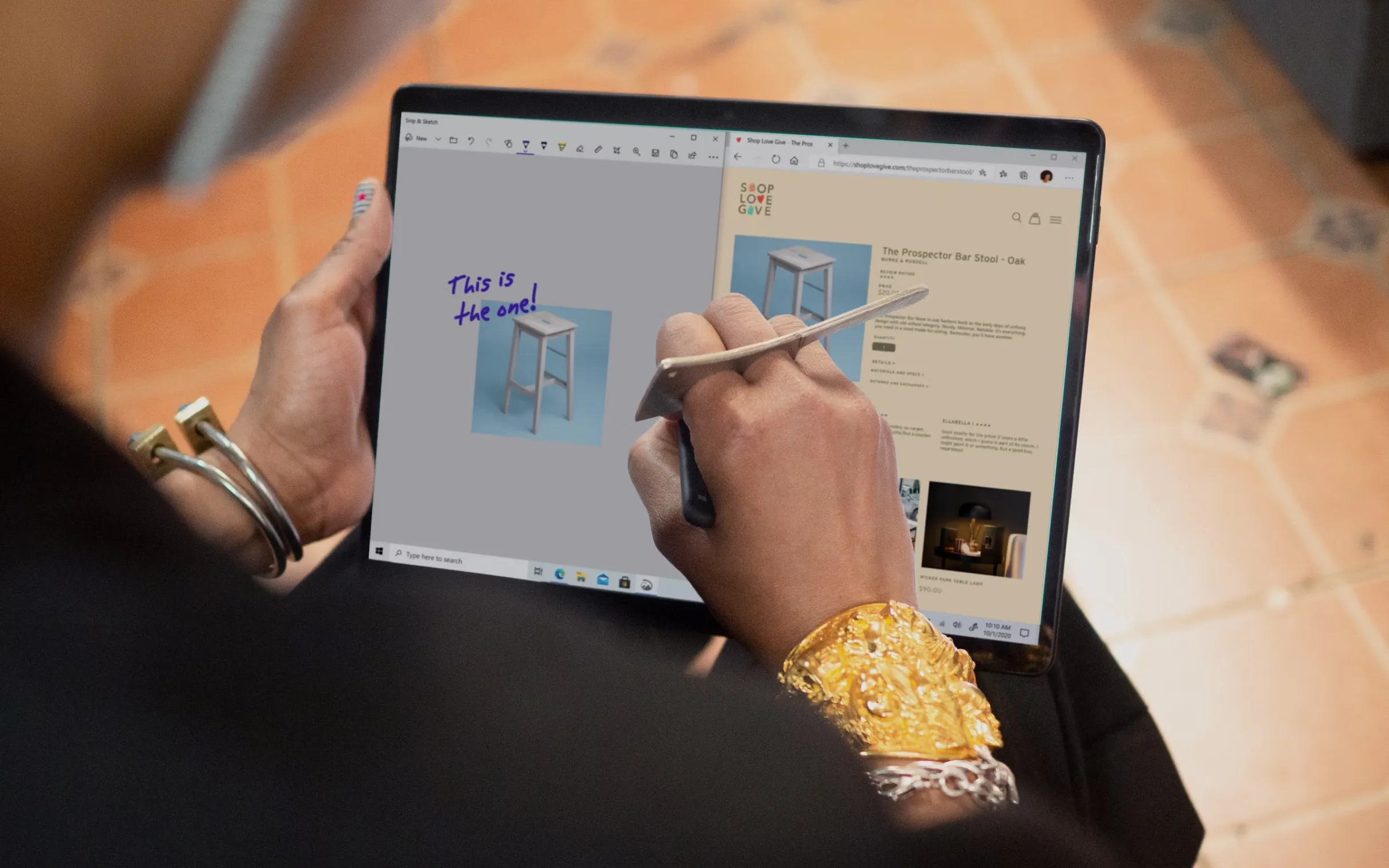 An image showing a person designing something on a tablet.