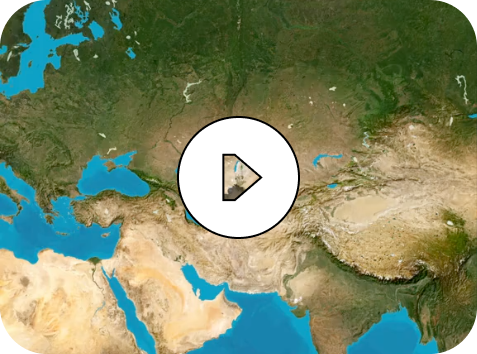 Satellite view showing a large region spanning parts of Europe, the Middle East, and Asia with a play button icon centered over Iran.
