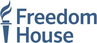 Freedom House logo featuring a stylized torch icon and the text 'Freedom House'.