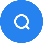 White magnifying glass search icon on a blue circular background.