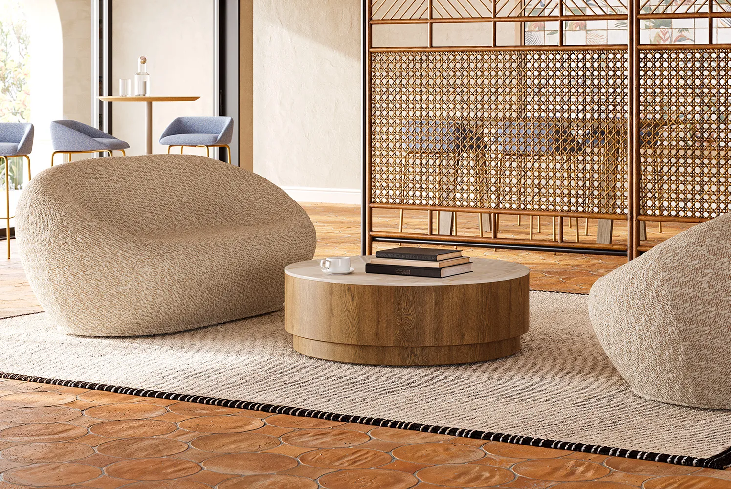 A large round ottoman with a white cover.