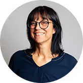 Testimonial image of a business professional giving feedback on Allthings services.