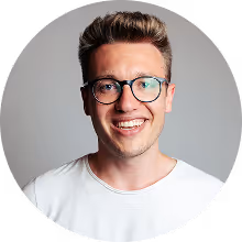 Testimonial image of a business professional giving feedback on Allthings services.