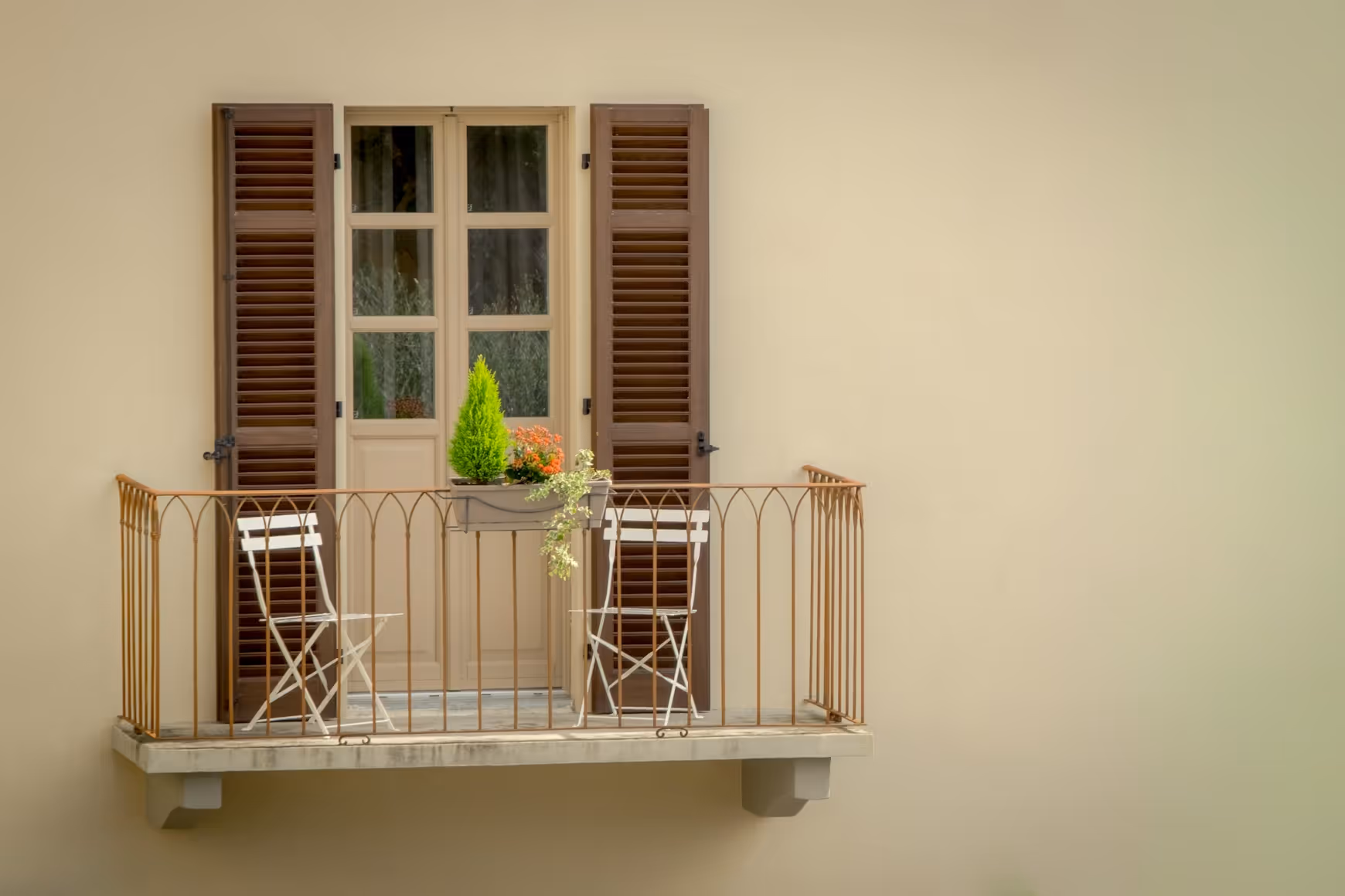 Feature article image of modern residential buildings under a clear blue sky.