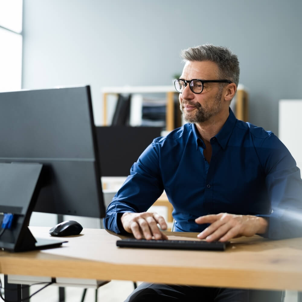 Man working in front of computer