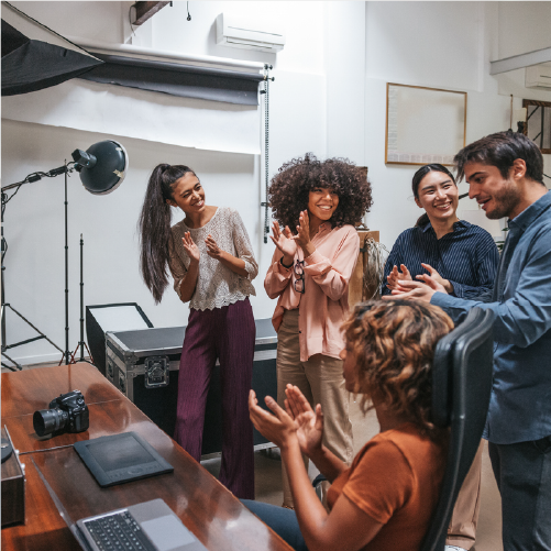 Dark futuristic room with a large floating sphere above a circular platform illuminated by soft overhead light.