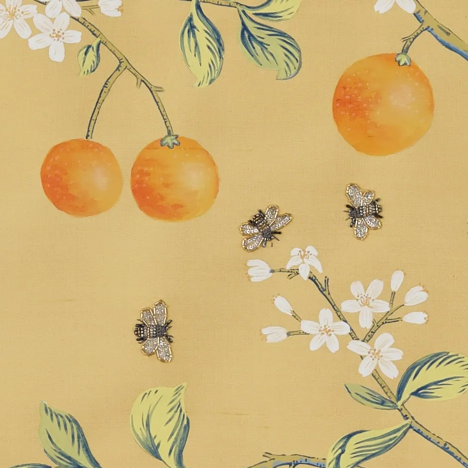 L'Orangerie Chinoiserie hand-painted wallcovering in Maize — citrus grove on silk with rhinestone and bead-embellished bees by Stang Design.