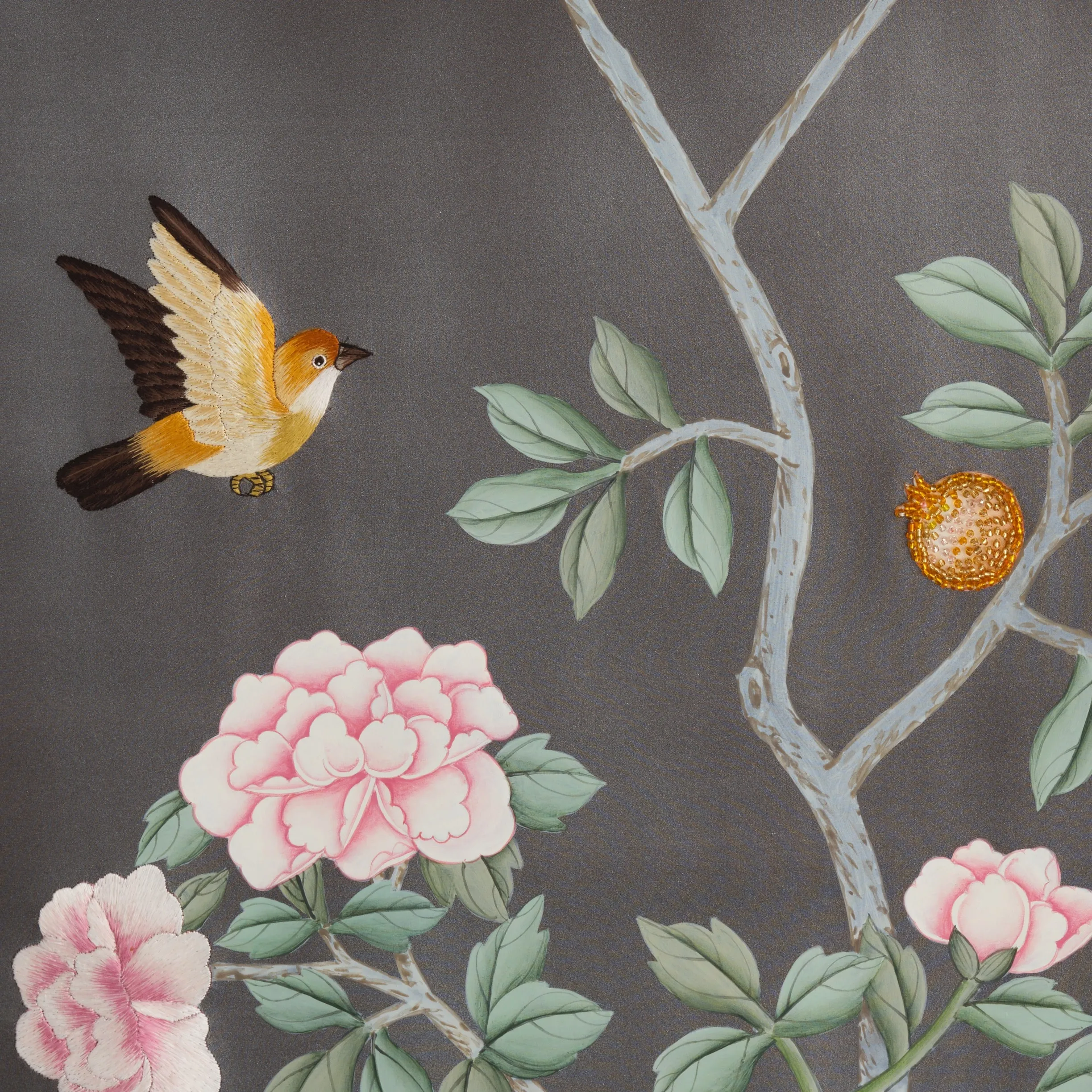 Detail of Serendipity Chinoiserie hand-painted wallcovering in Obsidian showing vibrant botanical motifs on a dramatic dark ground.