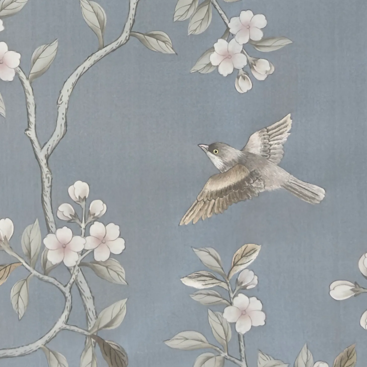 Serendipity Chinoiserie hand-painted wallcovering in Chambray, featuring botanical motifs and butterflies in gentle chambray tones by Stang Design.