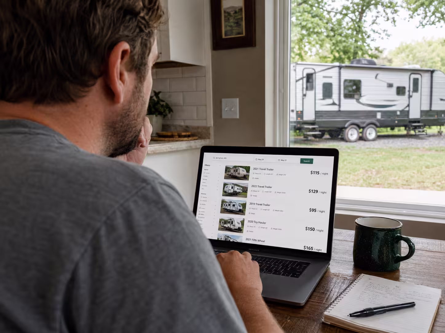 Renter comparing RV rental prices near Springfield, Missouri on a laptop