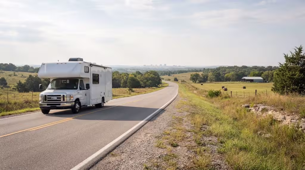 Class C motorhome on a rural two-lane highway heading toward Springfield, MO