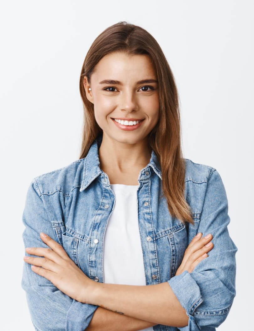Woman with crossed arms smiling