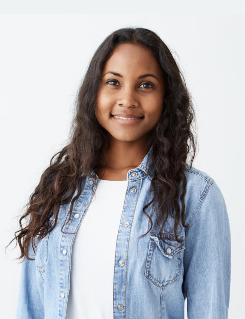 Woman smiling in casual office attire