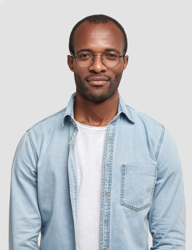 Man standing in casual professional outfit