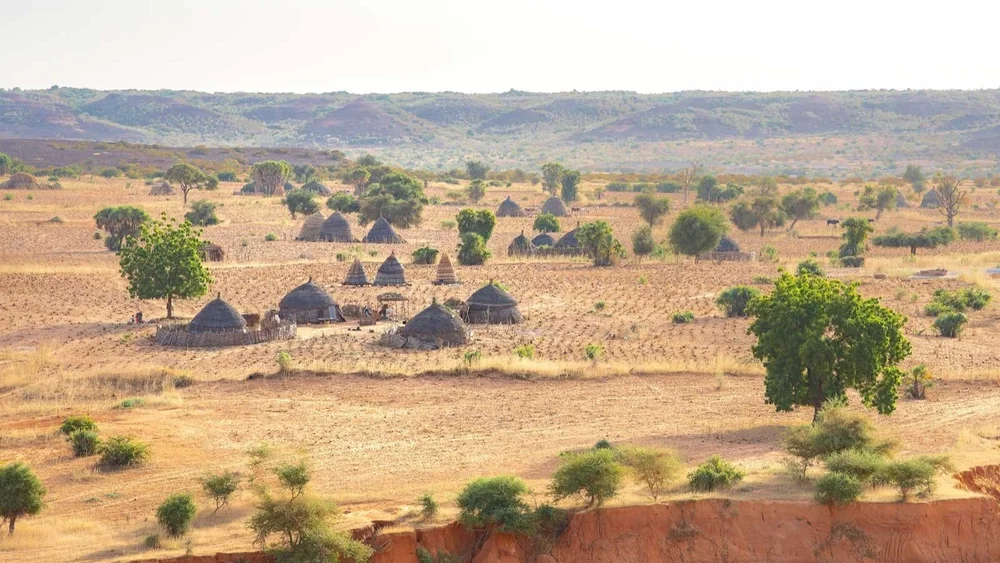 A small settlement in a desert landscape