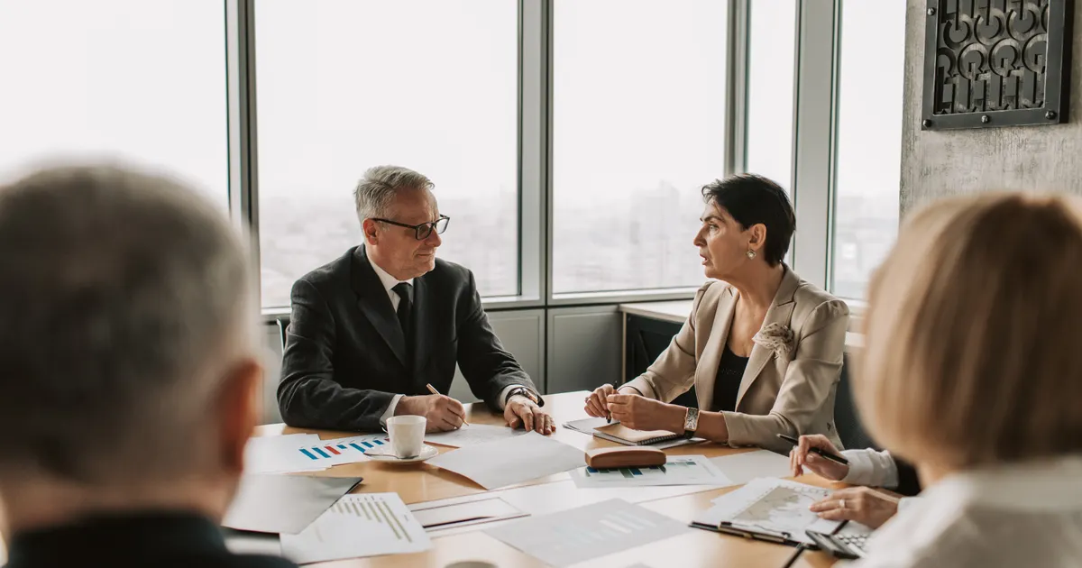 A marketing team reviewing performance data together in a meeting room