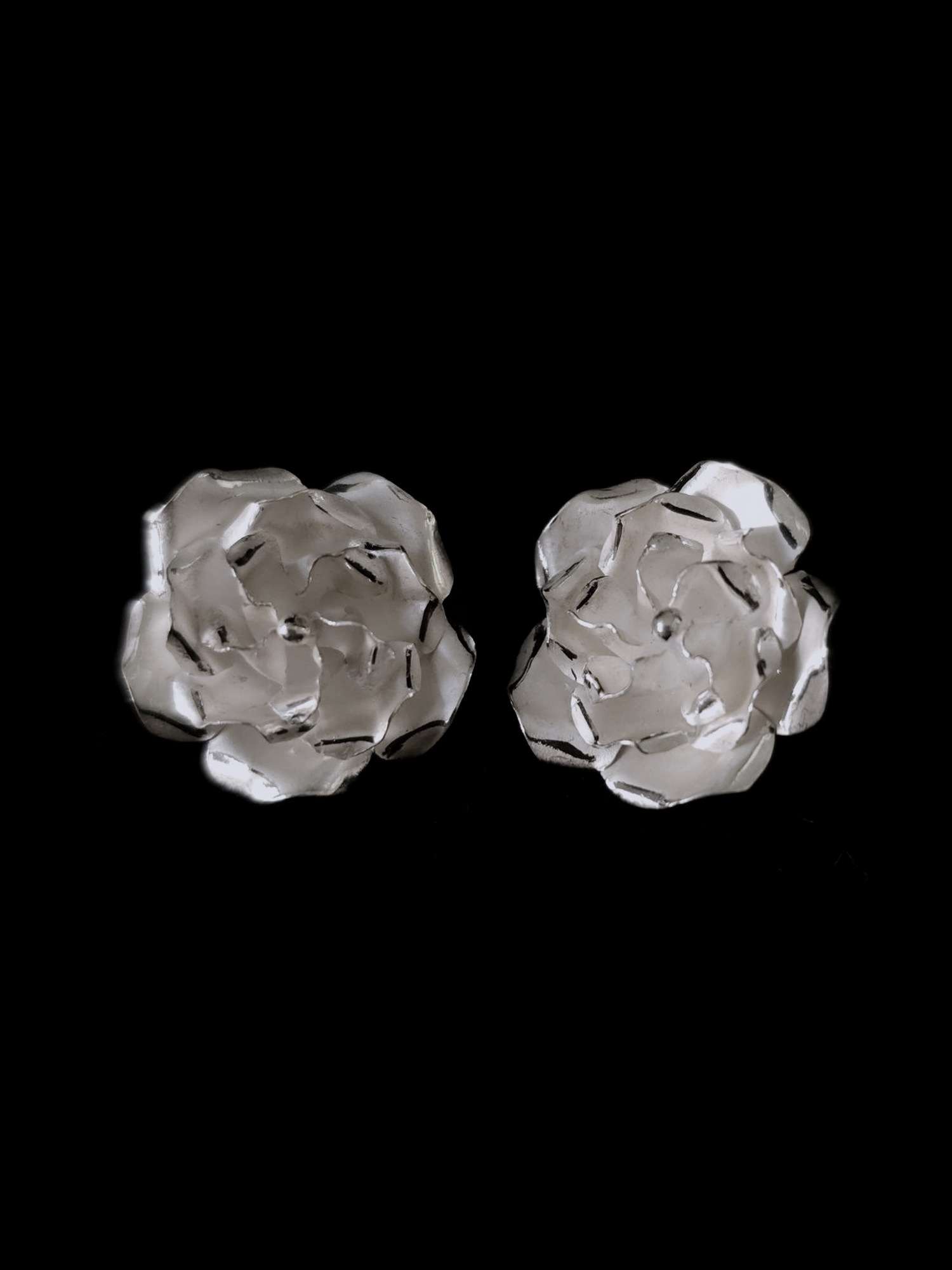 Polished rose stud earrings