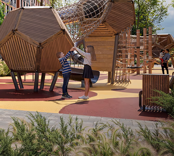 A couple of kids playing in a playground.