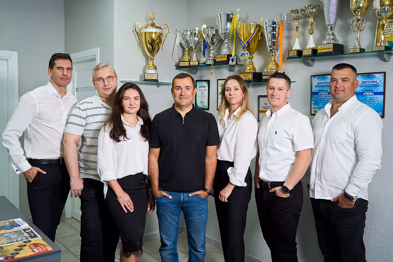 A group of people standing next to each other.