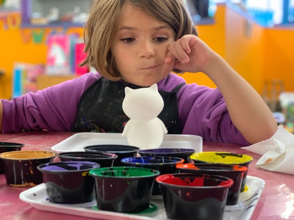 Juliana thinking about creative design to make.