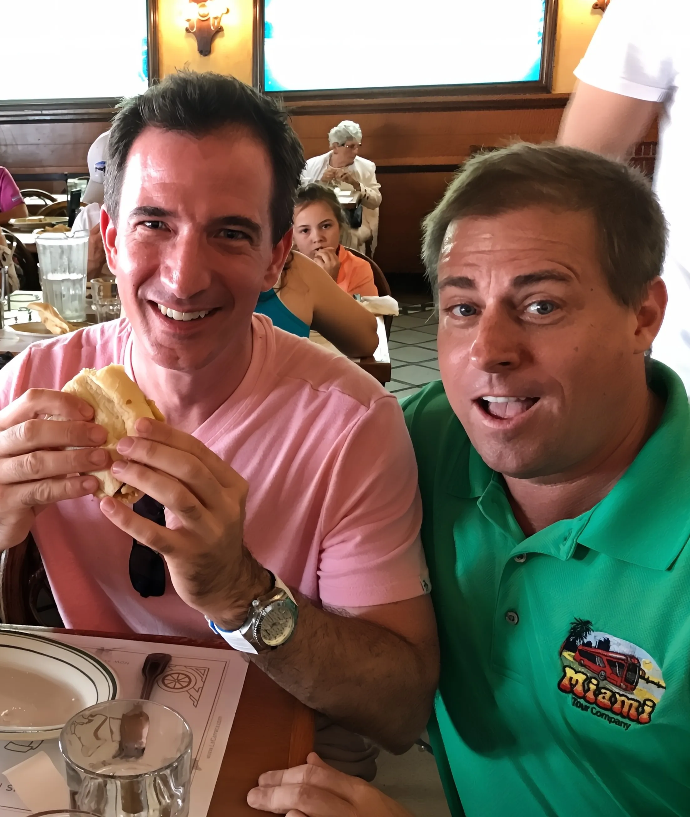 Gus Moore and a happy customers eating lunch
