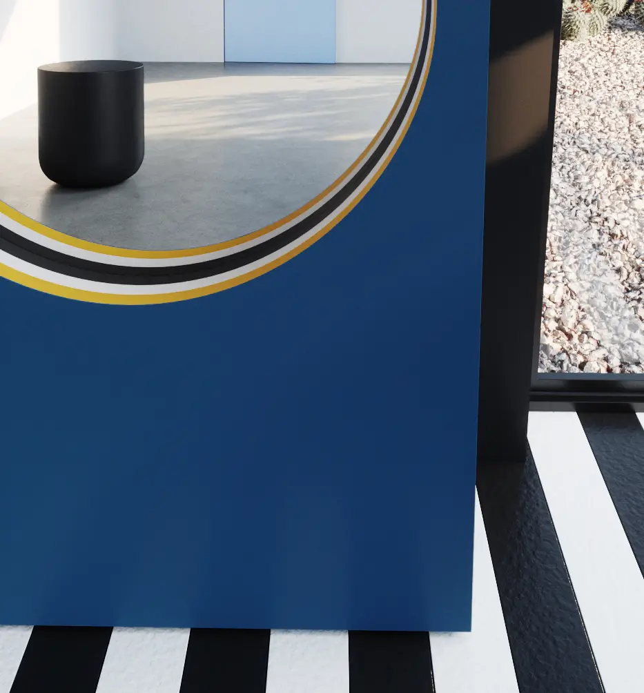 Zbliżenie na niebieską ramę lustra z kontrastowymi żółto-białymi paskami wewnątrz wycięcia